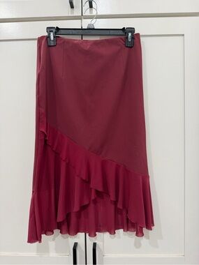 Halara women’s Burgundy asymmetrical skirt features a ruffled, flowy hem size M